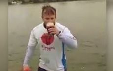 Man sips a pint of Guinness while somersaulting on a hoverboard (VIDEO)