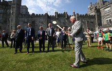 Prince Charles tries his hand at hurling during visit to Ireland