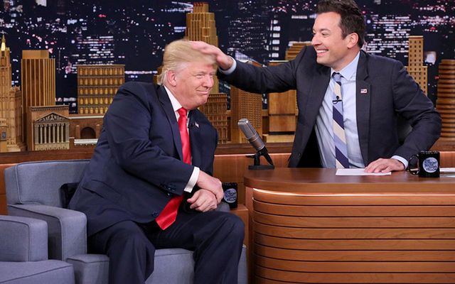 Jimmy Fallon \"messing up\" Donald Trump\'s hair.