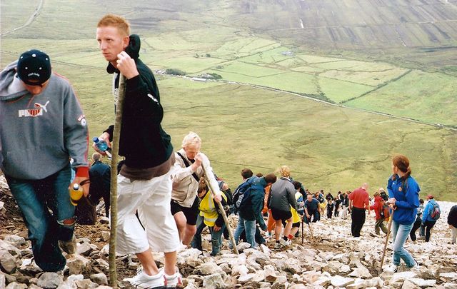 Pilgrims climb Croagh Patrick. 