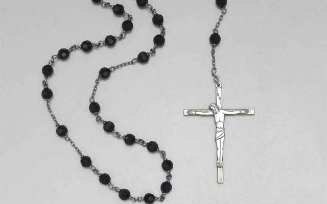 JFK\'s silver and black onyx rosary.