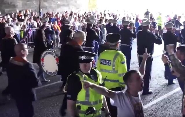 A still from a Twitter video of the Orange Order singing the banned Famine Song in Glasgow.