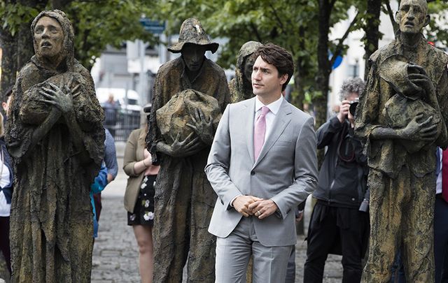 Canadian Prime Minister Justin Trudeau absorbing the haunting Famine Memorial on the Liffey quays, in Dublin. 