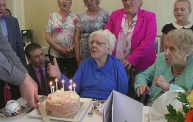 Maud Nicholl celebrating her 108th birthday with family and friend. 