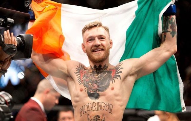 Conor McGregor proudly hoisting the Irish flag in Las Vegas in 2015.