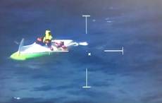 Incredible footage of Irish Air Corps rescuing two men trapped rowing the Atlantic