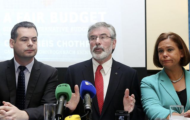 Sinn Fein\'s Pierce Doherty, Gerry Adams, and Mary Lou MacDonald.