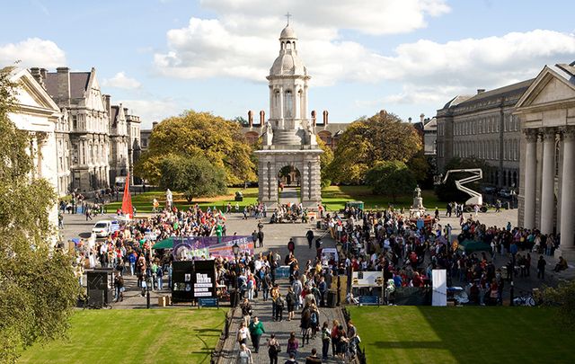 Trinity College Dublin\'s spectacular main square, with the Long Room building to the right. 
