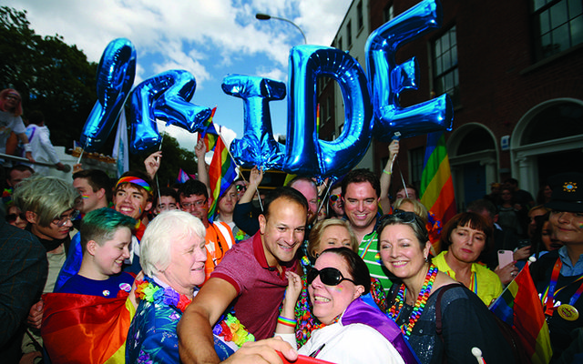 Leo Varadkar taking photos with the crowds at Dublin Pride. 