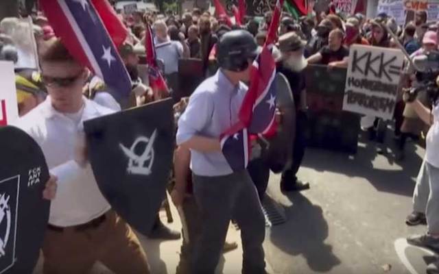 White marchers clash with counter protestors at Unite the Right rally in Charlottesville, Virginia.