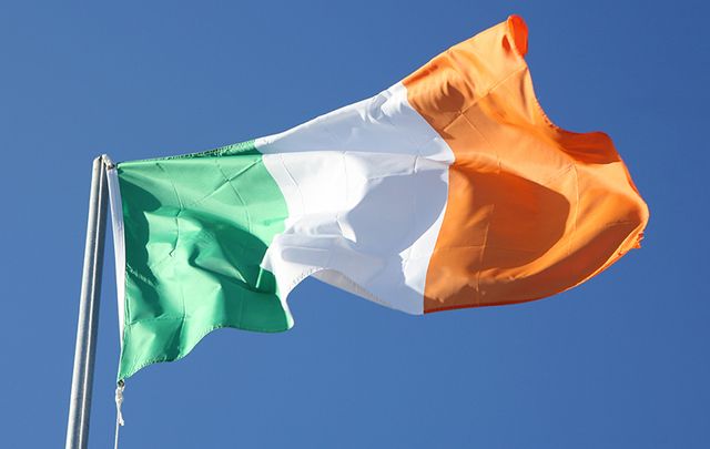 Ireland and Cote D'Ivoire flag waving in the wind against white