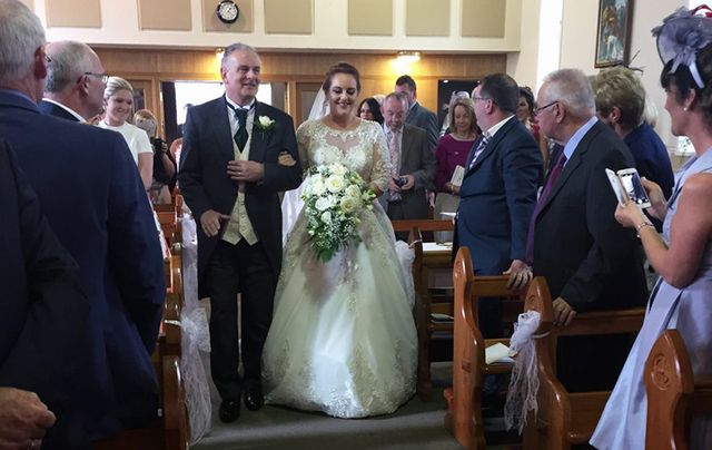The beautiful Eimear walking up the aisle with her father.