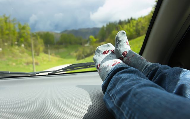Chilling with your feet up on the dash is not a good idea!