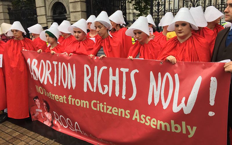 Irish pro-choice abortion group protest wearing chilling Handmaid’s Tale costumes
