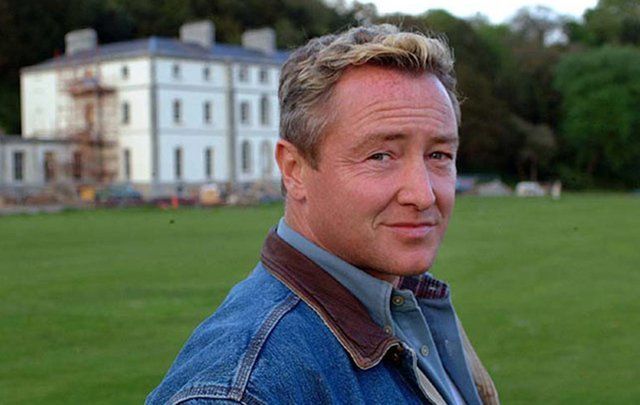 Michael Flatley outside his former home, Castle Hyde, Fermoy, Co. Cork. \n