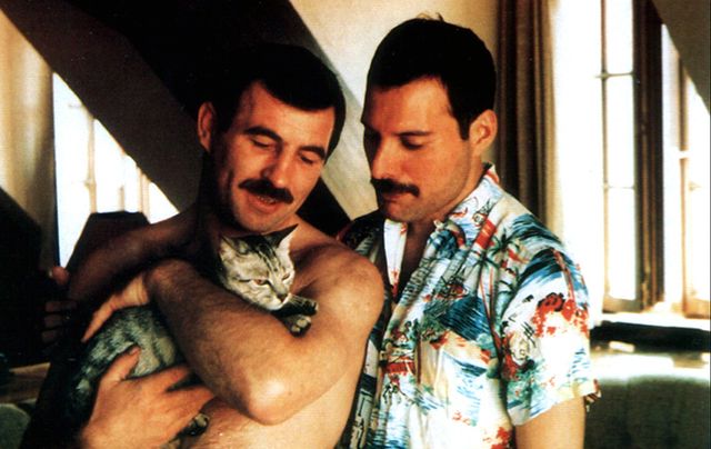 Jim Hutton with Freddie Mercury and their cat.