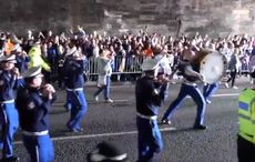 Police hunt for 4 men who sang anti-Irish famine song during Orange Order march