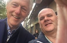 Unable to make NI trip to help break political stalemate, Bill Clinton explores Hurricane-struck Dublin 