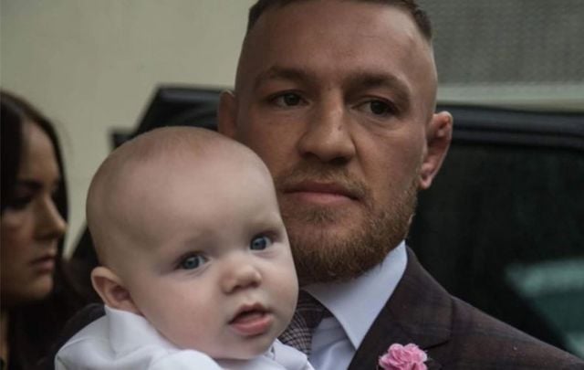 Conor McGregor with his son Conor McGregor Jr. on his christening day. 