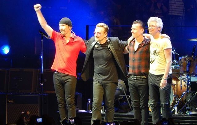 U2 - Bono, The Edge, Larry and Adam, greet the crowds at the United Center, in Chicago.