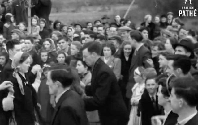 Screenshot of Pathé footage showing Drumshanbo locals dancing at the crossroads on St Patrick\'s Day in 1953.