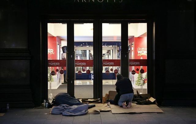 Groups of homeless people camp outside Arnott\'s department store, on Henry Street, in Dublin.