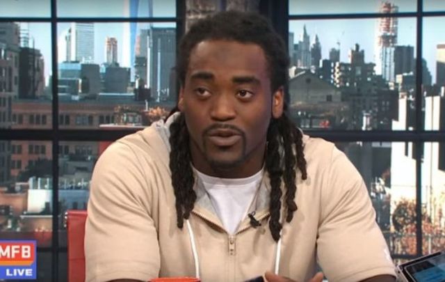 Alex Collins giving an interview about his Irish dancing on Good Morning Football. 
