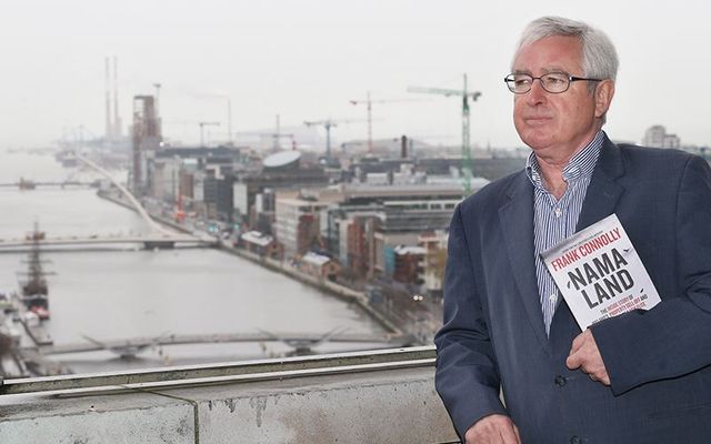 Author of NAMA Land, Frank Connolly, stands over looking construction sites in Dublin\'s docklands.