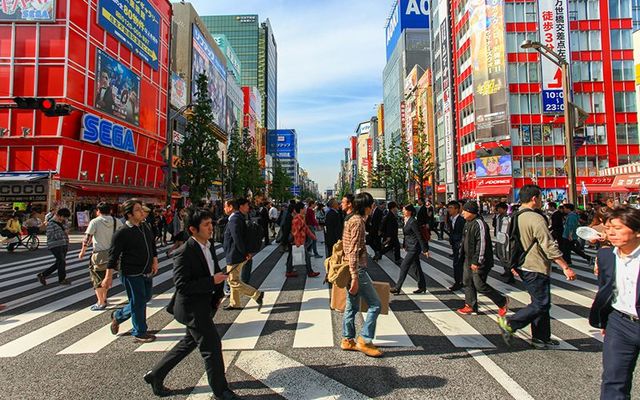 People crossing the street at Tokyo Akihabara area.