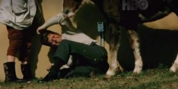 JFK plays with a horse the week before his death.