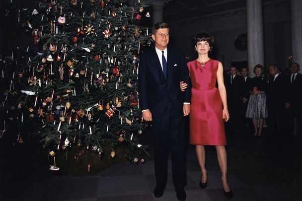President Kennedy and wife Jackie at a White House staff Christmas Party December 1962.