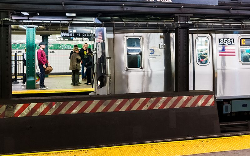 How did an Irishwoman survive being run over by three  NYC subway trains?