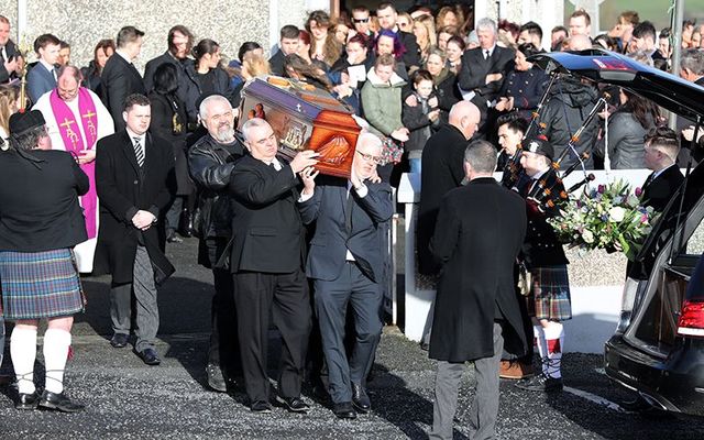 The coffin of Dolores O\'Riordan carried out of her family church, in Ballybricken, County Limerick. 