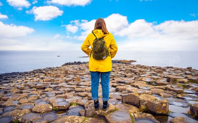 Standing at the Giant\'s Causeway, County Antrim, on an Irish Day Tour.