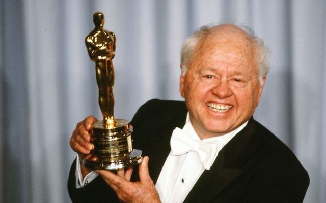 APRIL 11, 1983: Actor Mickey Rooney poses backstage after receiving \"Honorary Academy Award\" during the 55th Academy Awards at Dorothy Chandler Pavilion, Los Angeles, California.
