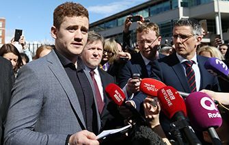 Found innocent: Paddy Jackson reading a statement outside court in Belfast.
