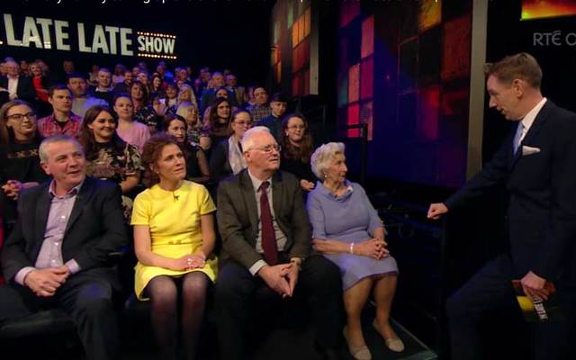 Late Late Show host Ryan Tubridy speaks to 90-year-old Irish mammy Nora Kelly as her 19 children look on. 