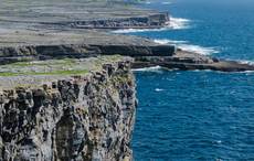 Part of the famous Inishmore Aran Island cliff falls into the sea