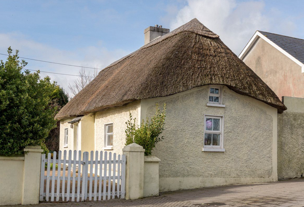 Thatched cottage on Main Street in Mooncoin, Co. Kilkenny.