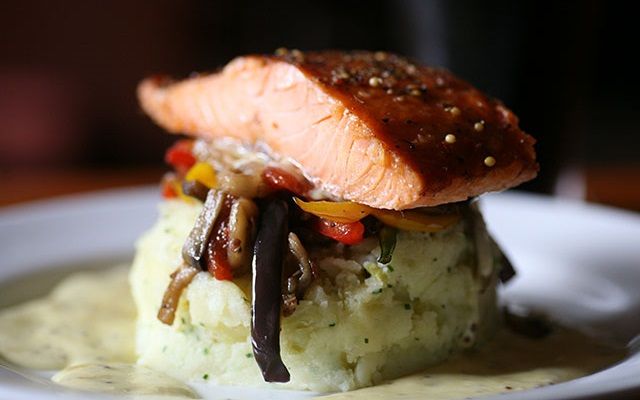 Burren hot-smoked salmon on a bed of colcannon with stir fried vegetables