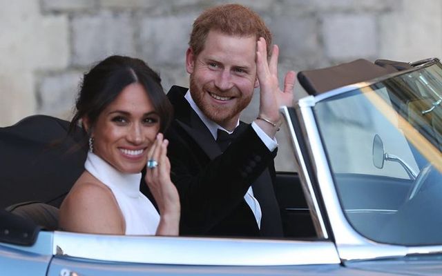 Meghan Markle and Prince Harry, the Duke and Duchess of Sussex, en route to the evening reception of their wedding.