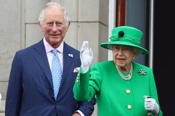 June 5, 2022: Prince Charles and Queen Elizabeth II stand on a balcony during the Platinum Jubilee Pageant in London, England. 