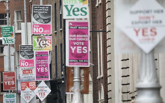 Yes and No Eighth Amendment abortion campaign posters along a street in Dublin.