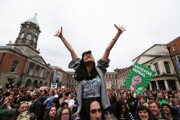 Woman among thousands celebrating the birth of a new Ireland on May 26. 66.4% of the Irish electorate voted yes to a change in Ireland\'s abortion laws.