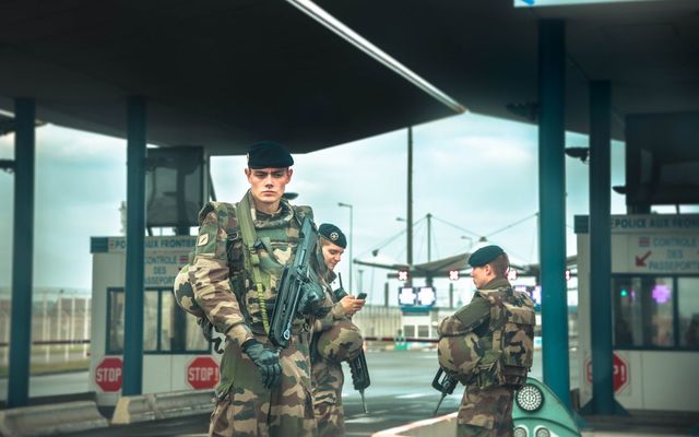 Military presence at France-UK border at Calais ferry terminal. 
