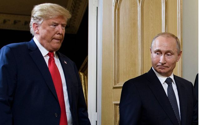 US President Donald Trump (L) and Russian President Vladimir Putin arrived for a meeting in Helsinki, on July 16, 2018.