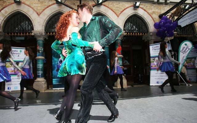 Lead dancers with Riverdance Amy-Mae Dolan James Greenan dance outside the Gaiety Theatre.