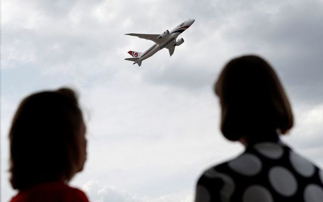 A Boeing 787-8 Dreamliner aircraft, operated by Biman Bangladesh Airlines, performs in a flying display at the Farnborough Airshow, south west of London, on July 18, 2018. 
