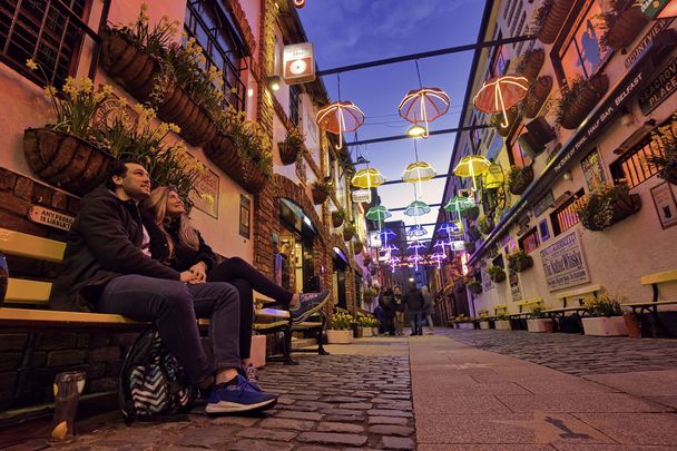 Strolling through the vibrant Cathedral Quater in Belfast.