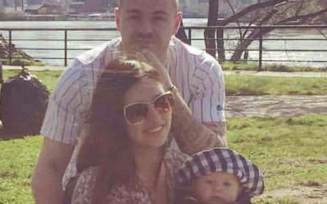 Conal McKee with his girlfriend and son. 